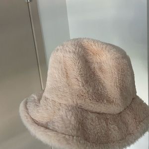 beige fuzzy bucket hat